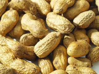 roasted peanuts for eating in white background