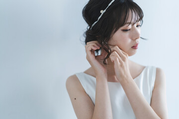 Fototapeta premium ウェディングドレスを着た花嫁