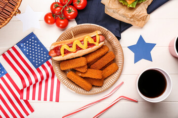 Traditional American food with flags on white wooden background