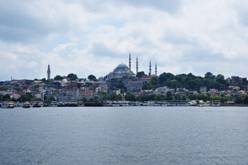 Fototapeta premium Panorama of Istanbul with a view of the Bosphorus and the mosque. Cloudy summer day.