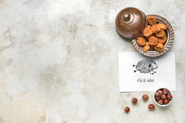 Greeting card for Eid al-Adha (Feast of the Sacrifice) with Turkish sweets on grunge background