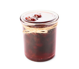 Glass jar with tasty cherry jam on white background
