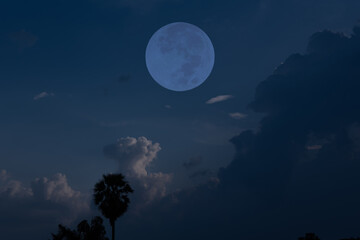 Fototapeta na wymiar Full moon on the sky with cloud.