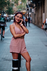Portrait of a latina woman in the city - fashion concept