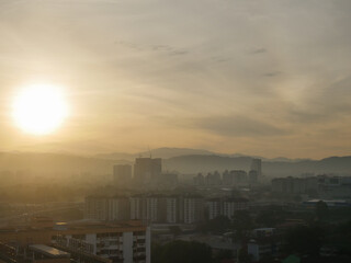 Sunrise on hazy morning over kuala Lumpur