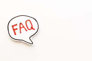 Concept of faq word on paper bubble. Frequently asked questions concept