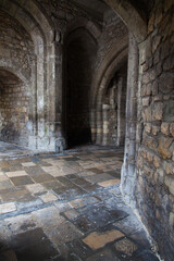 Fototapeta premium Old medieval castle stone corridors.