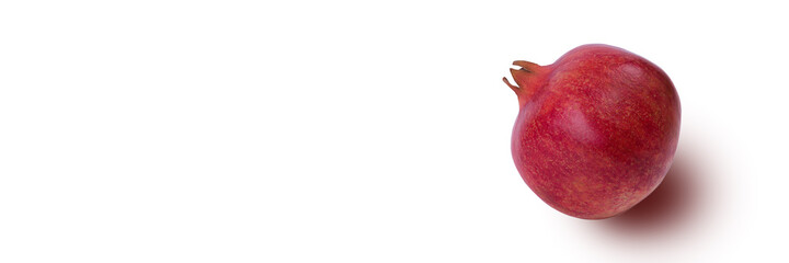 Garnet isolated on a white background close-up with shadow. Fresh pomegranate. Juicy pomegranate. Delicious pomegranate. Place for advertising, logo, lettering,