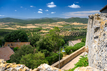 view from the old curtain wall of the picturesque tuscan village of Capalbio