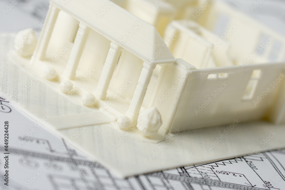 Poster Close-up of 3D model of the house printed on a 3D printer with white filament by FDM technology for architectural use.