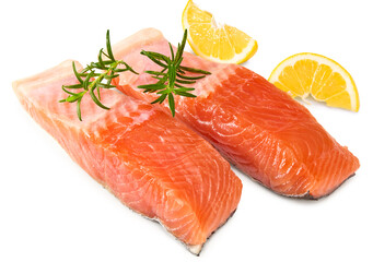 Red fish. Raw salmon fillet with rosemary and lemon isolate on white background. Clipping path and full depth of field.