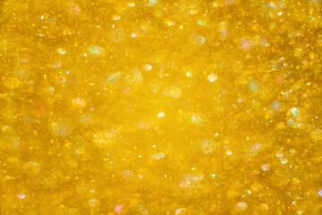 Abstract gold texture glitter lights background. de-focused.