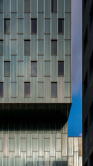 Sky reflections on a crystal facade