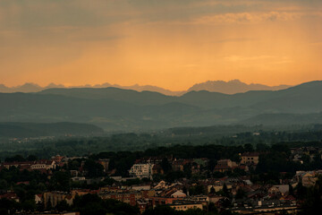 sunset over the city with the Tatra Mountains line