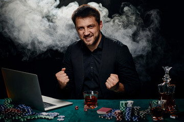 Bearded online casino player man celebrating victory