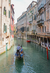 Fototapeta na wymiar Gondola ride in Venice channels