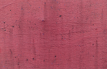 Red paint on wooden background