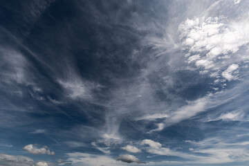 Summer Blue Sky and white cloud white background. Beautiful clear cloudy in sunlight calm season. 