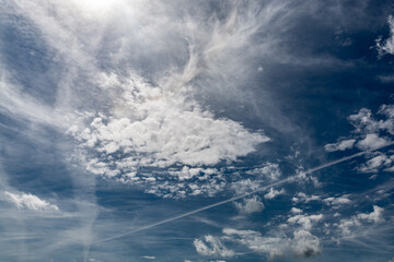 Summer Blue Sky and white cloud white background. Beautiful clear cloudy in sunlight calm season. 