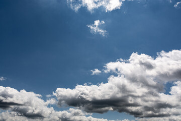 Summer Blue Sky and white cloud white background. Beautiful clear cloudy in sunlight calm season. 