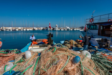 ISKELE, URLA, IZMIR, TURKEY. Fishing nets on the pier