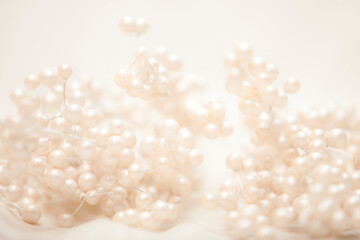 decorative white pearls nestled in luxurious silk