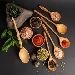 spice spoons on marble table in the kitchen