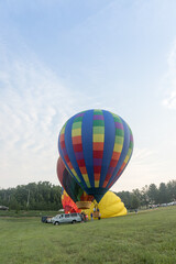 Fototapeta premium Hot air balloons takes flight in the early morning at the Wytheville Chautauqua Balloon Festival in 2021.