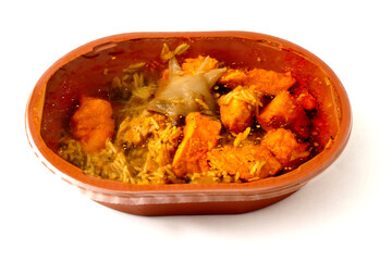 Chicken jalfrezi dish in a plastic bowl
