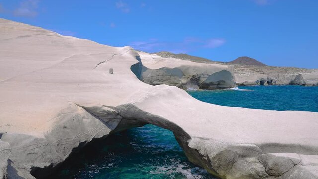 Parallax tracking of volcanic rock arch formations along the coast of Sarakiniko Beach, Milos Greek Island, Greece