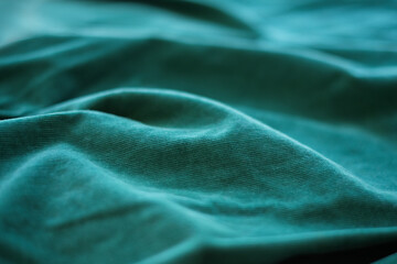 Dark green cotton velvet fabric as background - obrazy, fototapety, plakaty