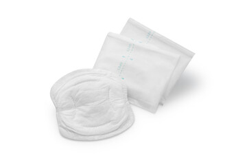 Obraz premium Disposable white cotton nipple pads for breastfeeding mothers isolated