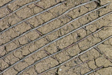 a wall made of clay and straw