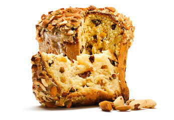 Delicious panettone with dry fruits and almond frosting isolated