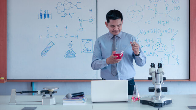 Teacher is teaching science classes online during lockdown due to COVID-19 pandemic