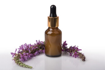 Cosmetic lotion in a bottle with lilac flowers. On white background.