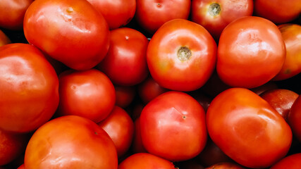 Tomatoes on shelf stacked texture background