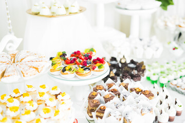 Delicious wedding reception candy bar dessert table
