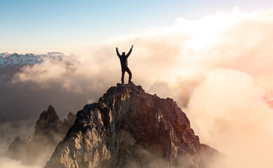 Adventure Composite. Adventurous Man with Open Hands is taking in the moment on top of a mountain....