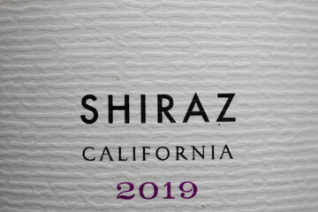 Closeup of isolated bottle white label with text shiraz california 2019