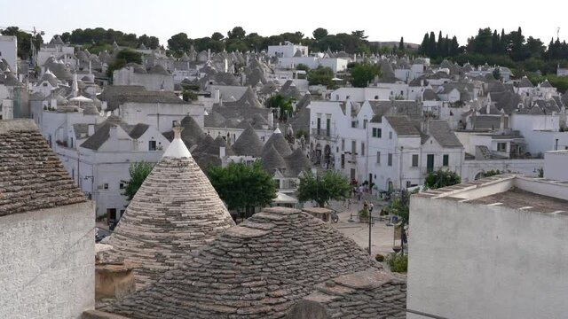 Scenic panoramic sight in Alberobello, the famous Trulli village in Puglia (Apulia), southern Italy.