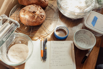 Fresh bread cooling on a baker's station inside of a home
