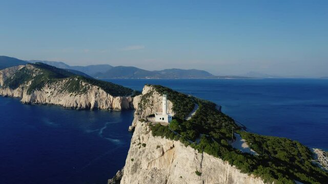 Aerial view of Cape of Ducato, famous lighthouse of Greek island Lefkada, tracking shot, 4K.
