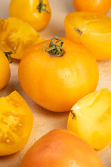 Yellow Tomatoes as high detailed close-up shot on a table