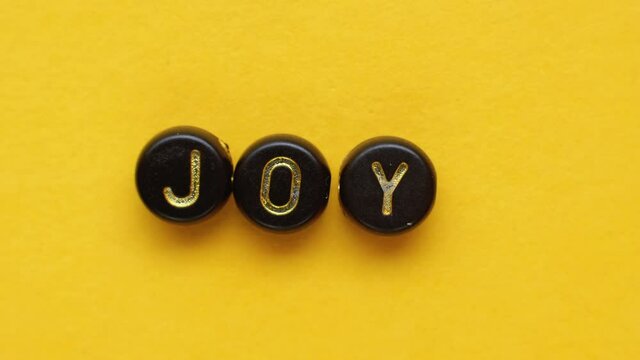 joy word enjoying life happy cubes letters orange
