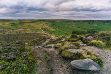 A View of a Scenic Hill With a Hiking Trail In Stanage Edge, South Yorkshire, England