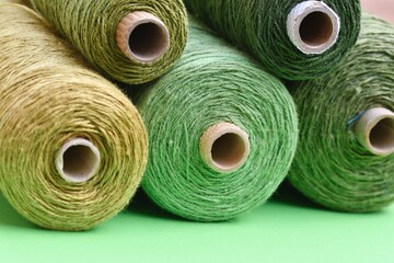 Photo of threads in different shades of green