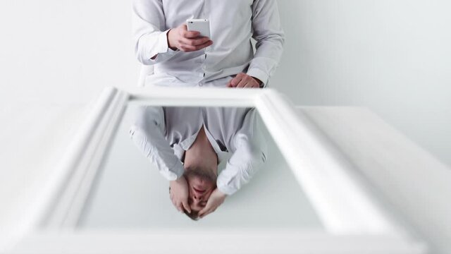 phone dependency cyberbullying problem man mirror