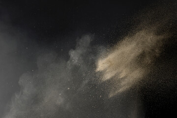 Sand thrown with sand dust and fine particles - obrazy, fototapety, plakaty