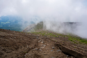宮崎県小林市、西諸県郡高原町、都城市、鹿児島県霧島市の高千穂峰を登山している風景 Scenery of climbing Takachiho Peak in Kobayashi City, Nishimorokata-gun Takaharu-cho, Miyakonojo City, Miyazaki Prefecture and Kirishima City, Kagoshima 